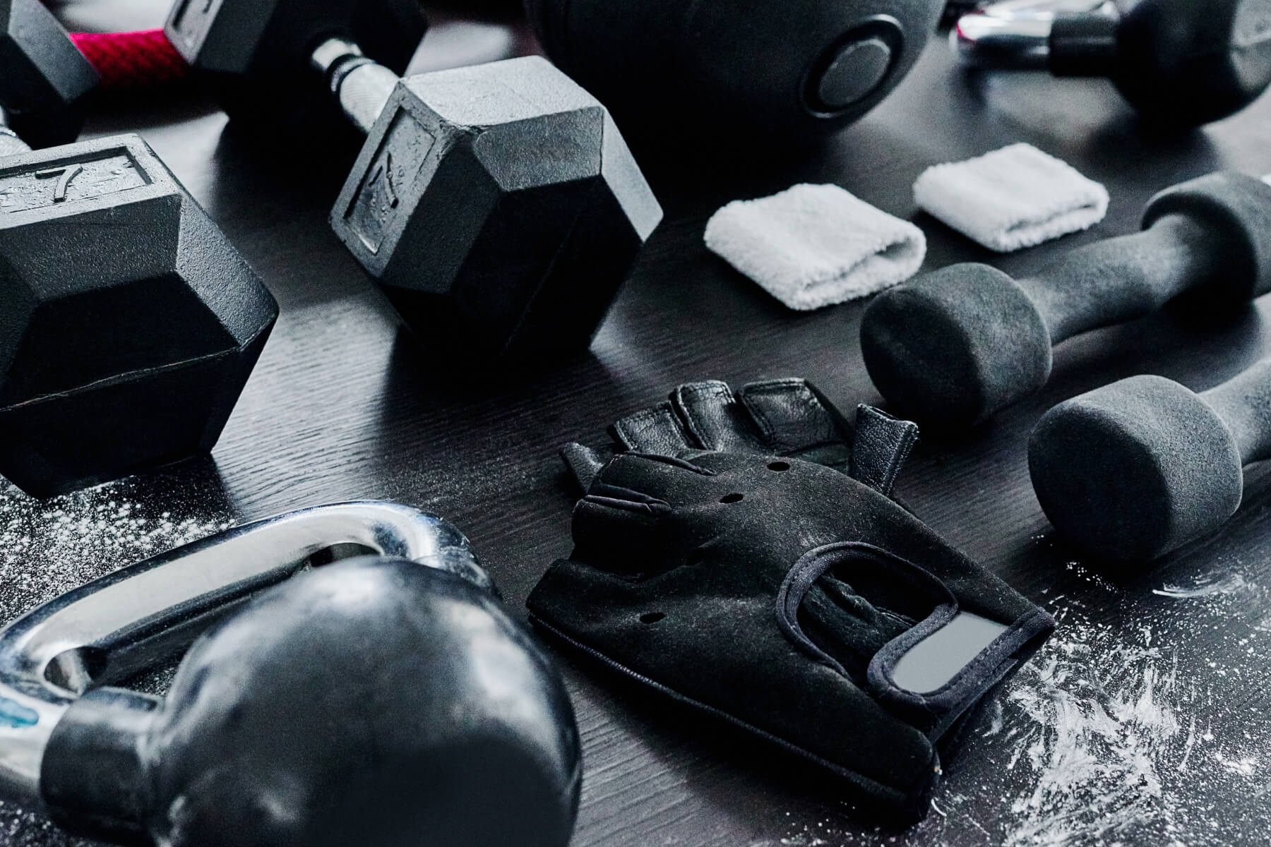 Fitness workout essentials including kettlebells, dumbbells and training equipment